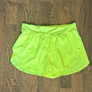 Lululemon Fast & Free bright yellow shorts, size 10.